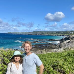 Logo of Virtuoso Family Travel with a family symbol.